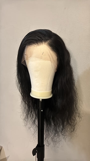 13x4 lace frontal and pre-plucked hairline of the natural black human hair wig on a mannequin